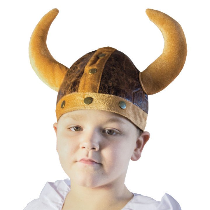 Child wearing a Viking helmet with large horns on a white background