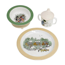 Set of melamine dishware featuring art from Children of Noisy Village on a white background