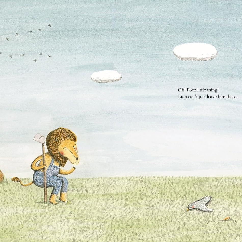A whimsical illustrated scene showing a lion standing on grassy ground with a gardening hoe, looking toward a bird on the ground, a tree stump, and a rock. The background is a pale blue sky with clouds and birds, and small text appears on the right.