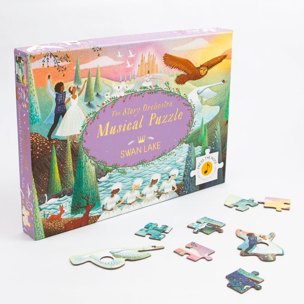 Swan Lake musical puzzle set with box and pieces on a white background