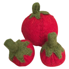 3 felted tomatoes on a white background