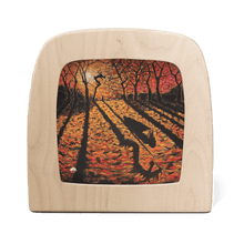 Silhouette of an autumn landscape of trees and a sunset on a white background