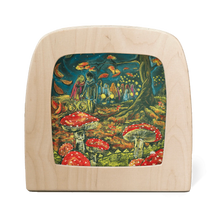 Silhouette of a children carrying lanterns in a toadstool forest