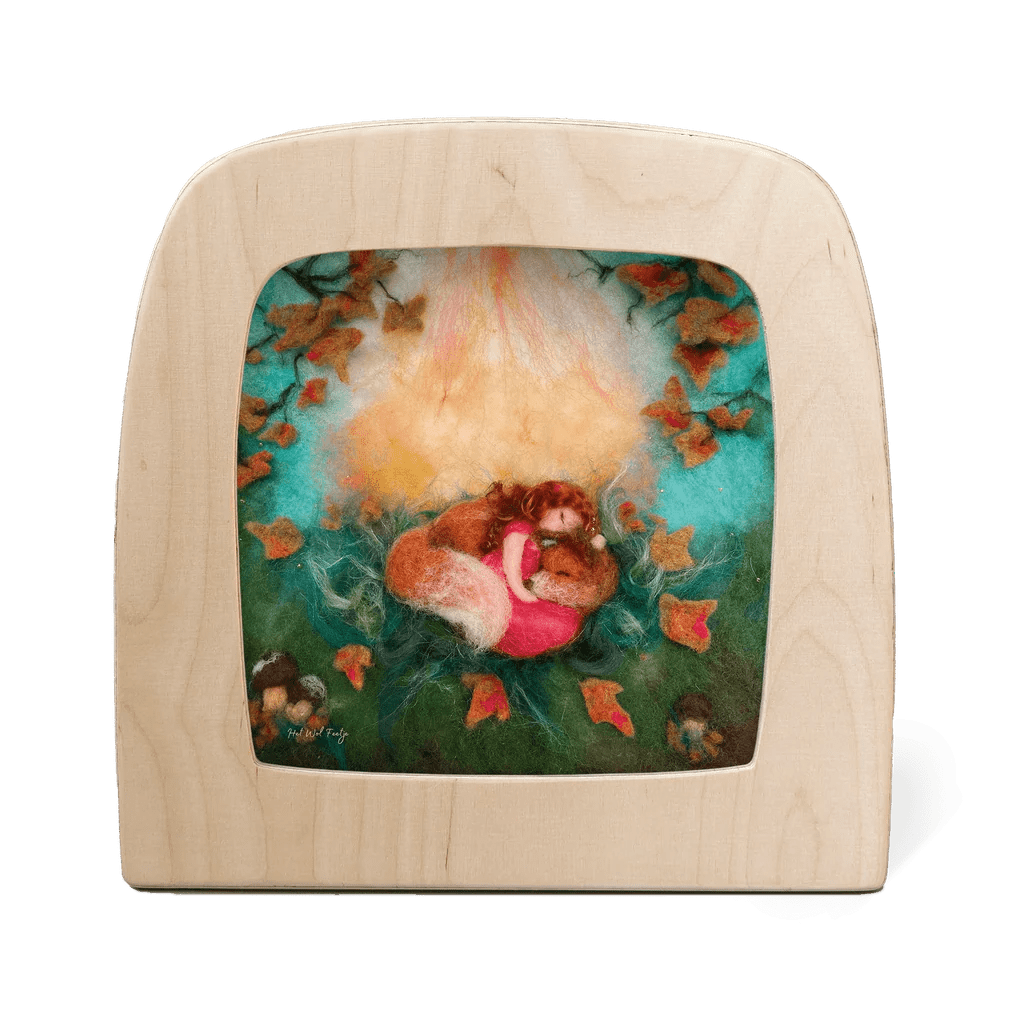 Silhouette of a girl napping with a fox in the autumn forest