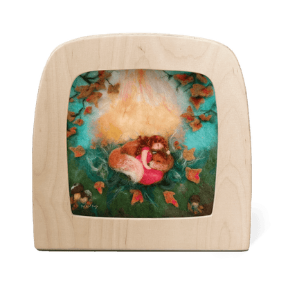 Silhouette of a girl napping with a fox in the autumn forest