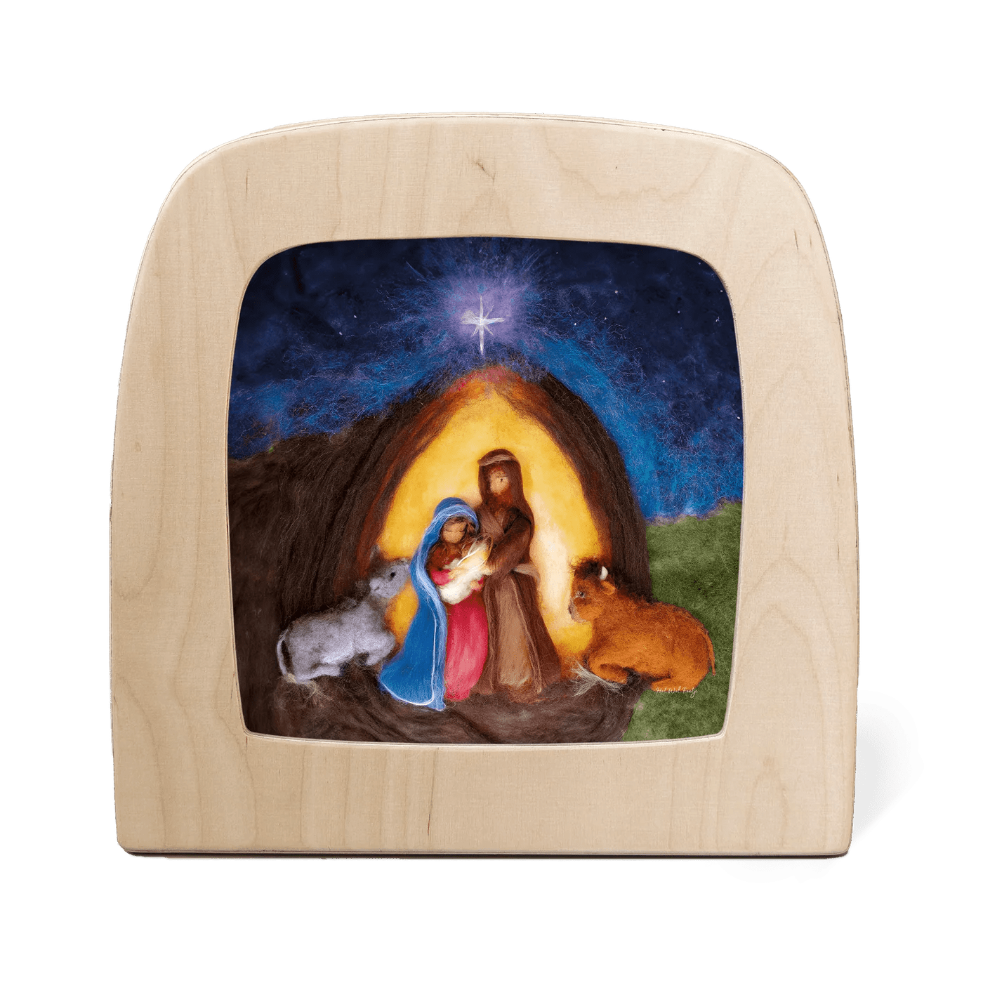 Silhouette of a Nativity scene featuring Mary, Joseph, Baby Jesus, and two cows