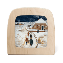 Silhouette of a winter scene painting of people walking in a snowy landscape.