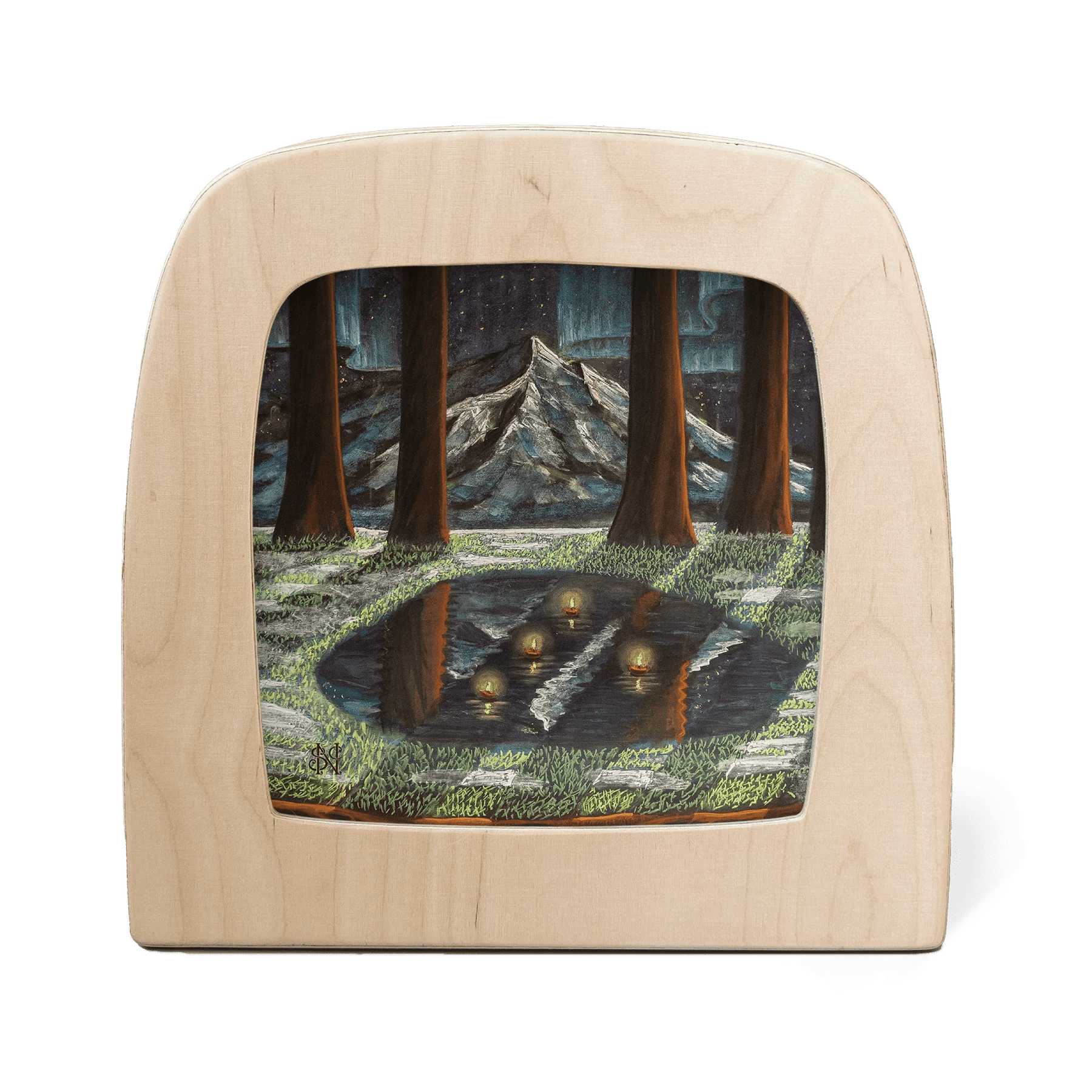 Wooden frame with silhouette of a moonlit forest with melting snow and a mountain landscape and aurora borealis in the background