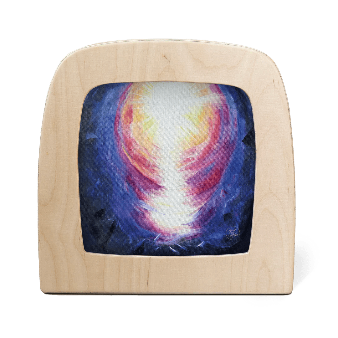 Wooden frame with a colorful abstract design of a bright light against a dark background