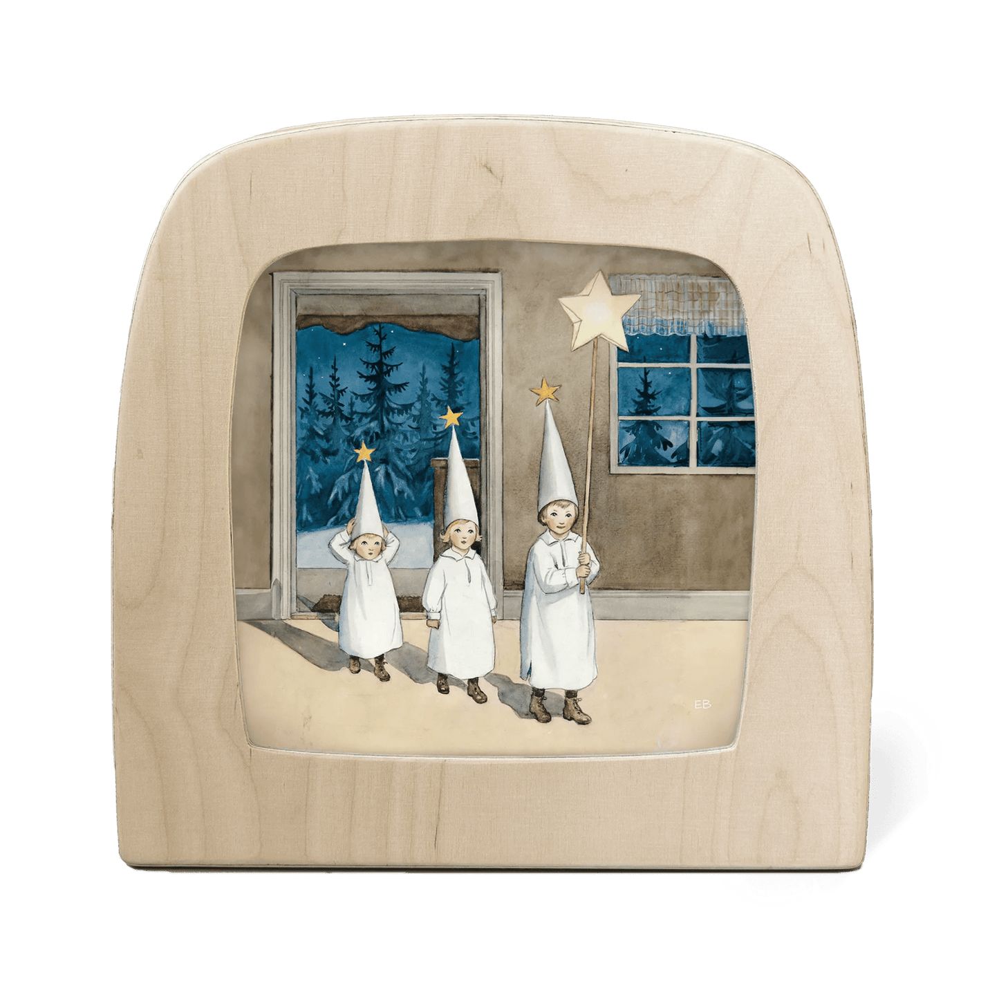 Silhouette of three children in white outfits and hats holding stars, set against a window view of trees.