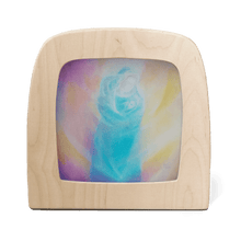 Wooden frame with a colorful abstract design inside on a white background