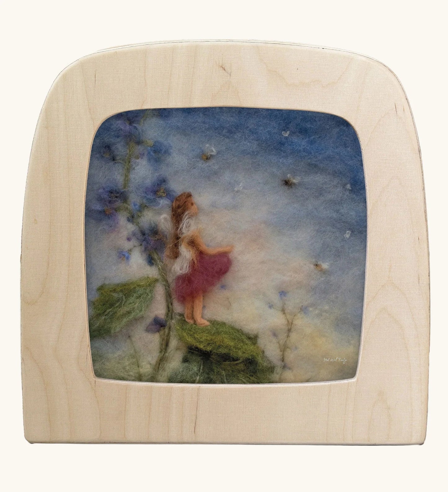 Silhouette of a girl standing on a leaf watching bees buzzing around her.