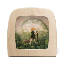 Silhouette of a young child adventuring through nature