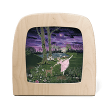 Silhouette with two ballerinas dancing in a meadow at night with fawn and swans