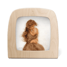 Silhouette of a mother embracing her child