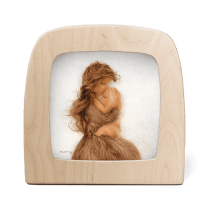 Silhouette of a mother embracing her child