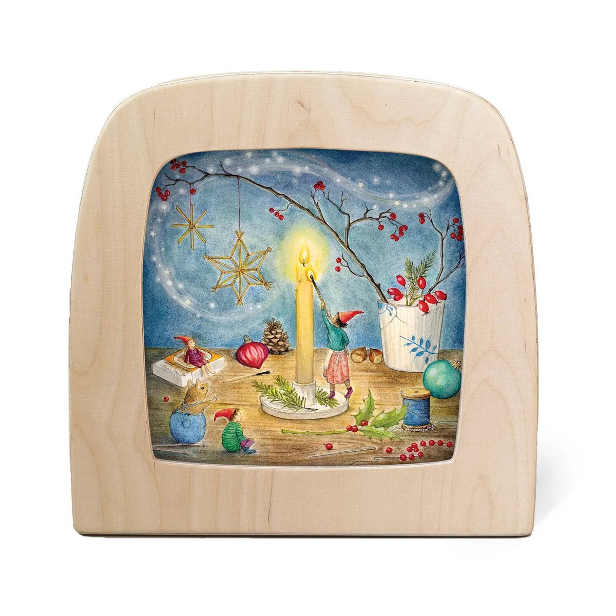 Toverlux lamp featuring a colorful Christmas illustration of a child by a candle, hanging ornaments, and a starry night sky.