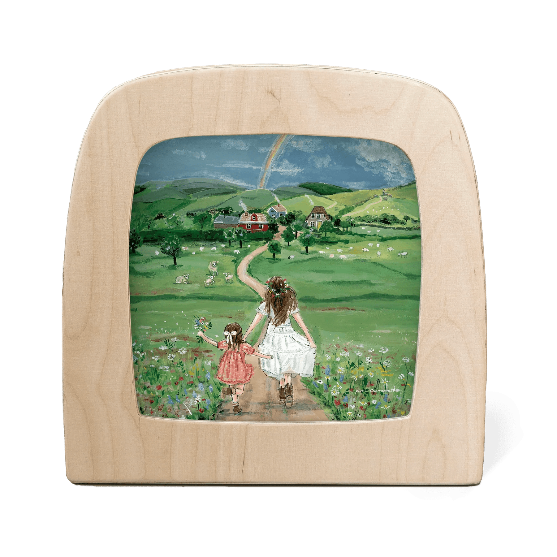 Wooden frame with a painted scene of two girls in a field with a rainbow in the background