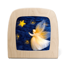 Wooden frame with a fairy and star design on a blue background