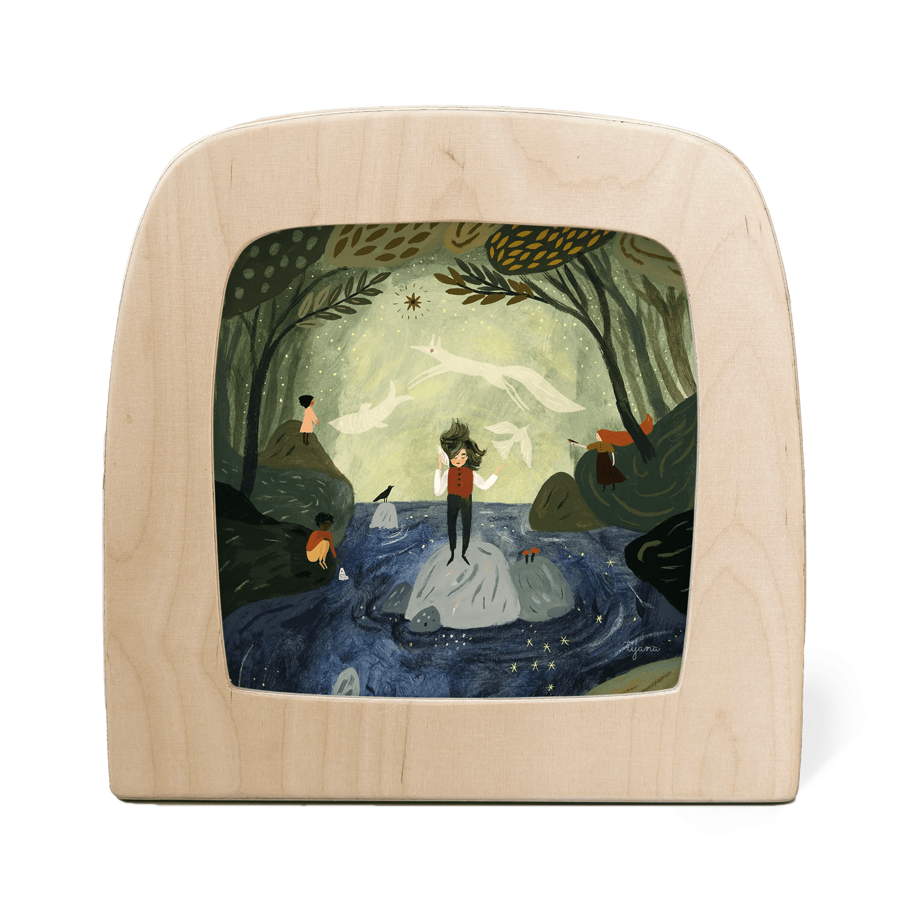 Wooden frame with a painted scene of a person standing on a rock in a forest.