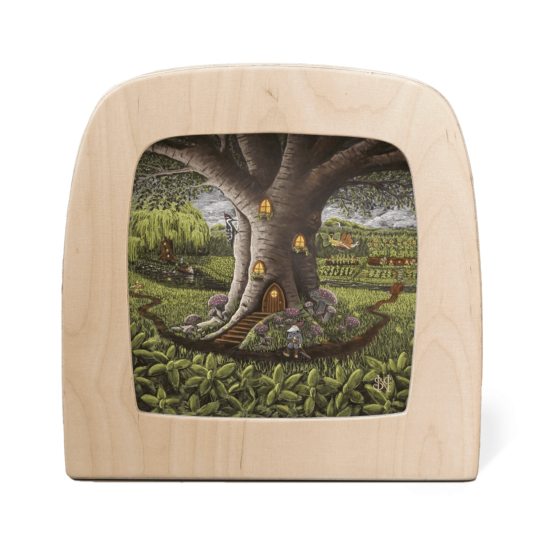 A gnome stands outside of a large tree that has been converted into a home with illuminated lights, in the middle of a field