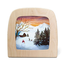 Silhouette of a winter scene with two children sledding