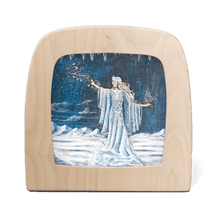 Silhouette featuring a snow queen with  a snowy cave in the background