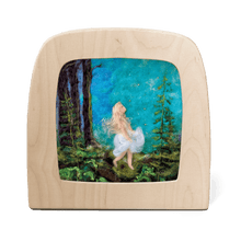 Scene of a girl looking up at the starry sky in a wooden frame