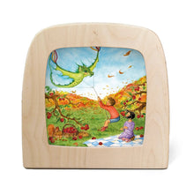 Toverlux lamp featuring a colorful illustration of a child flying a green dragon kite in an apple orchard.