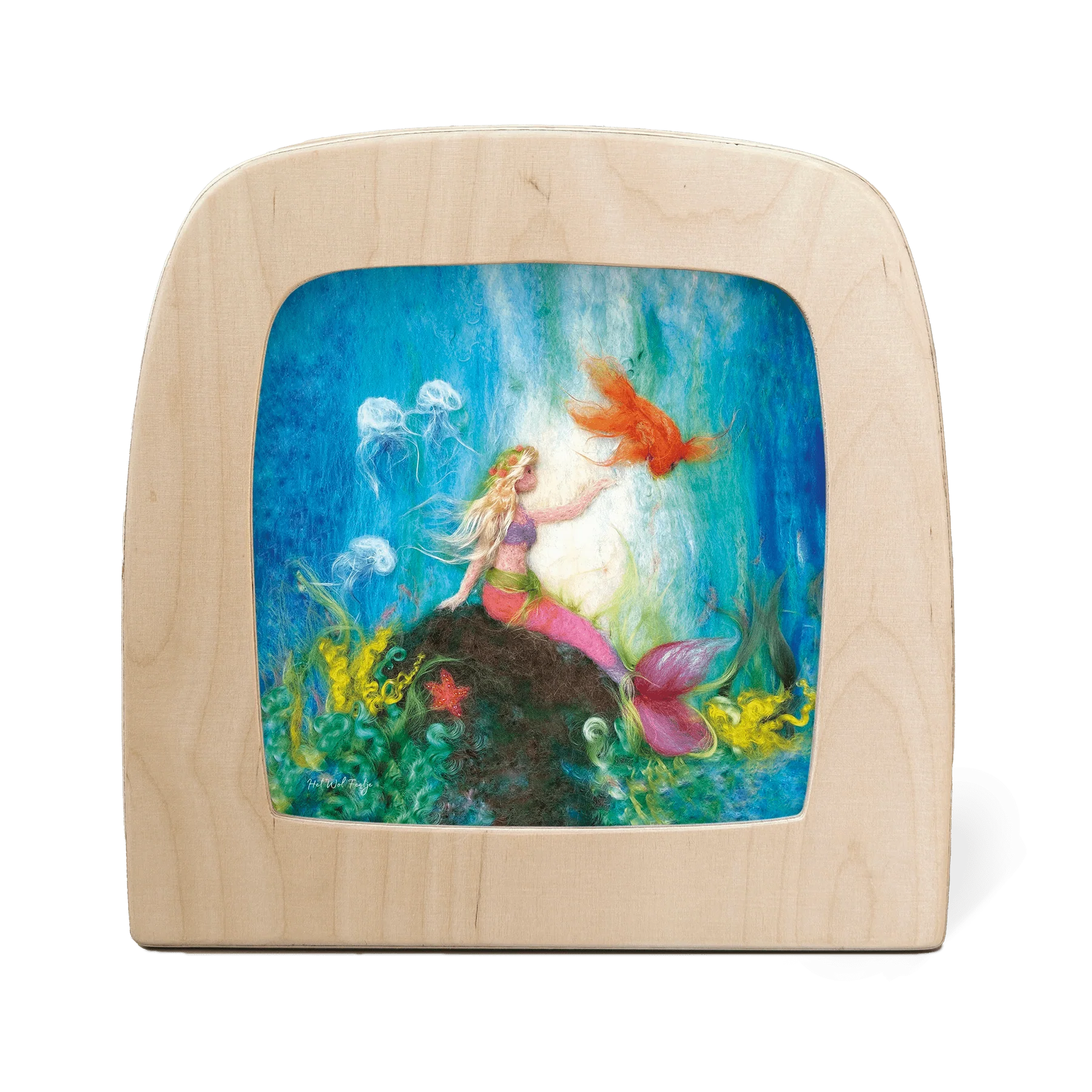 Silhouette of a mermaid resting on a rock underwater, surrounded by jellyfish and a goldfish