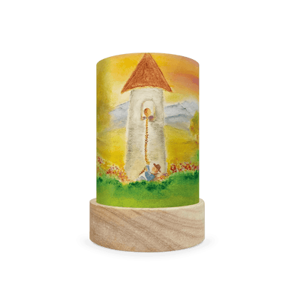 Decorative lamp depicting a scene from Rapunzel on a white background