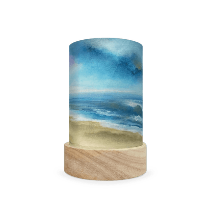 Cylindrical lamp with beach scene design on a white background