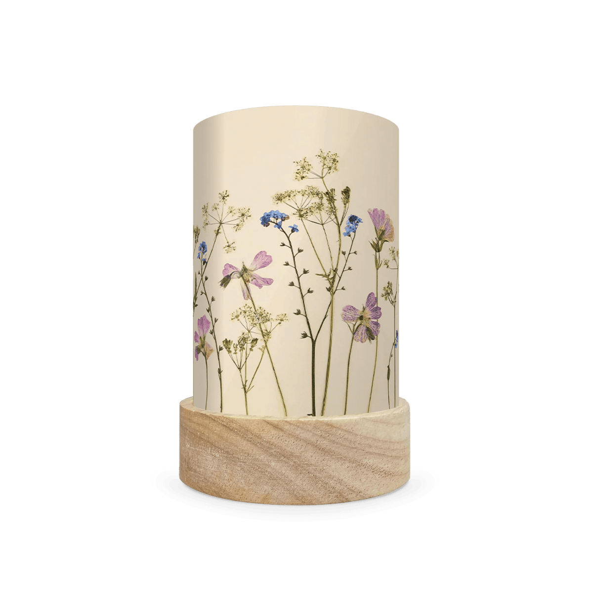 Mini lantern silhouette of pressed pink and blue flowers and bright green leaves on a light background