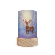 A cylindrical decorative lamp shade with deer