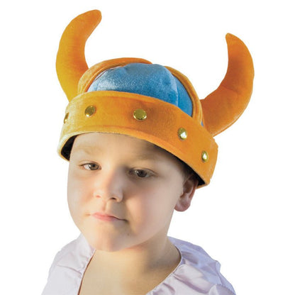 Child wearing a Viking helmet with horns on a white background