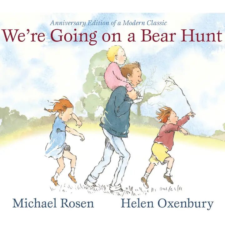Book cover of 'We're Going on a Bear Hunt' with children and father illustration.