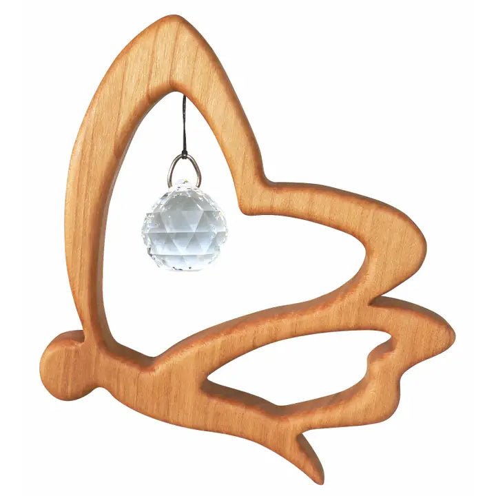Wooden butterfly-shaped suncatcher with crystal ball on a white background