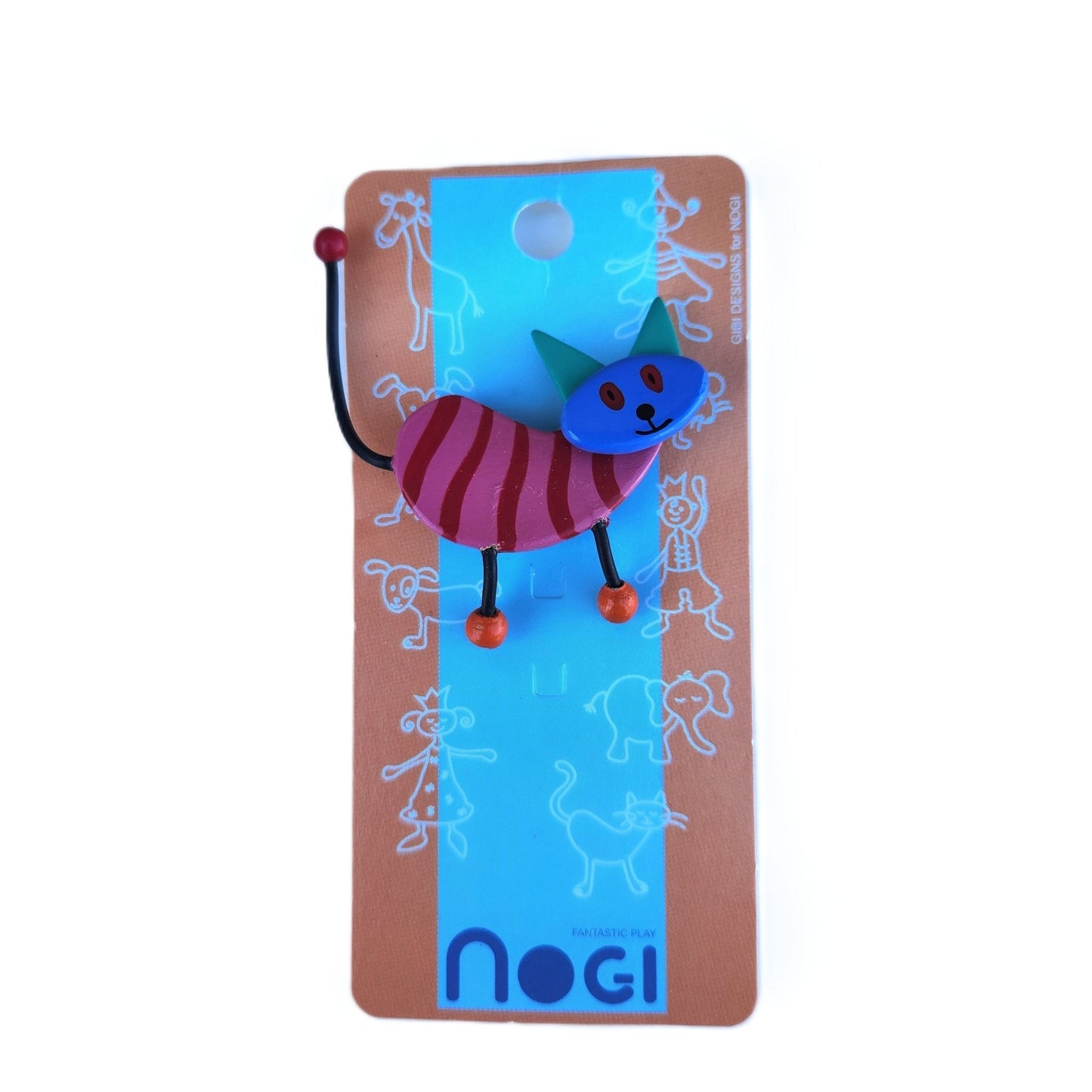 Wooden pin of red and pink striped cat with green ears and blue face on Nogi branded packaging