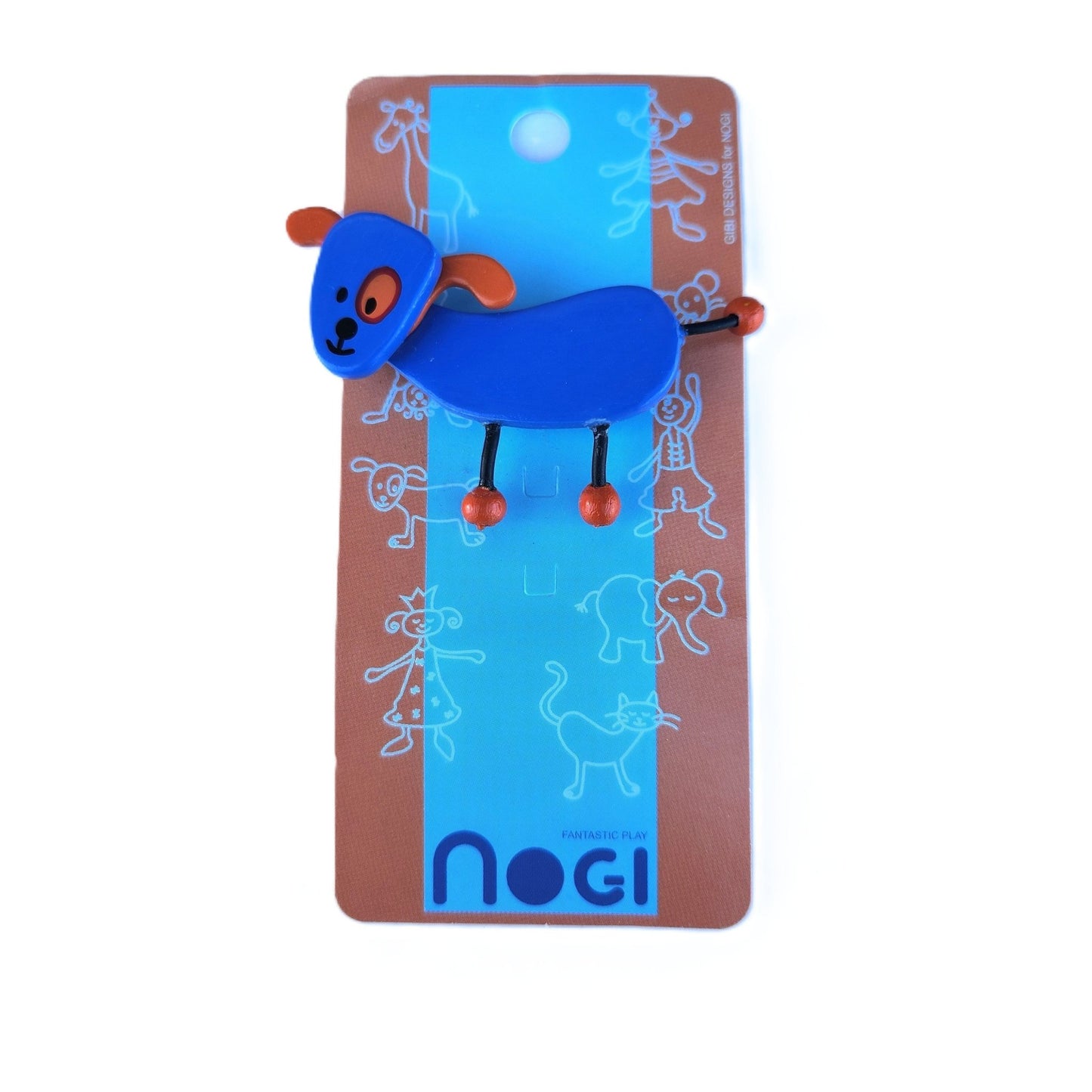 Wooden pin of blue dog with orange ears on Nogi branded packaging