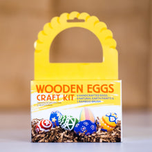 Wooden eggs craft kit packaging with colorful eggs on a neutral background