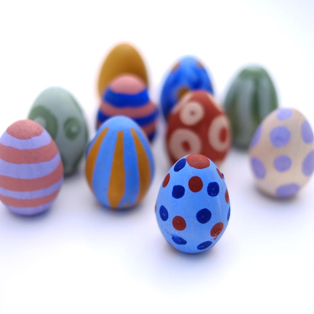 Colorful Easter eggs with various patterns on a white background