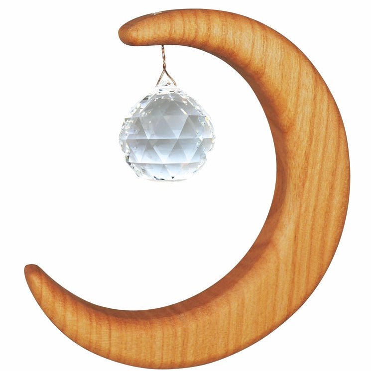 Wooden crescent moon suncatcher with a crystal ball on a white background