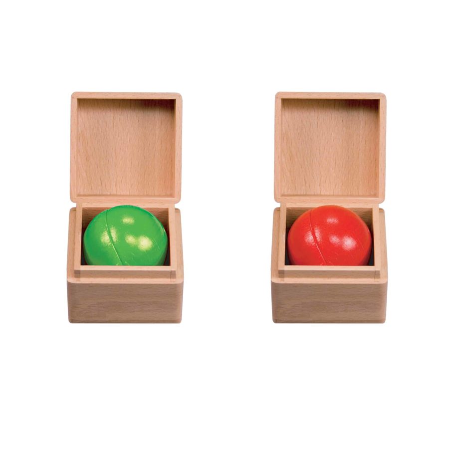 Two wooden boxes with green and red balls inside on a white background