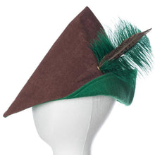 Brown and green pointed hat with feather on a white mannequin head against a white background